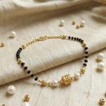 Elegant Black Bead Gold Bracelet with Pearl Detailing