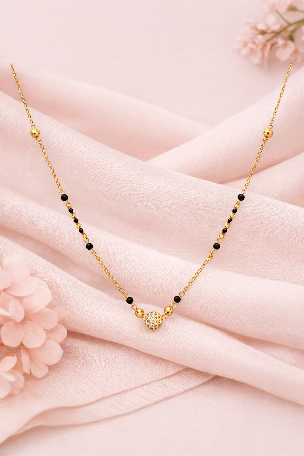 Elegant Black Bead Mangalsutra with Designer Gold Pendant