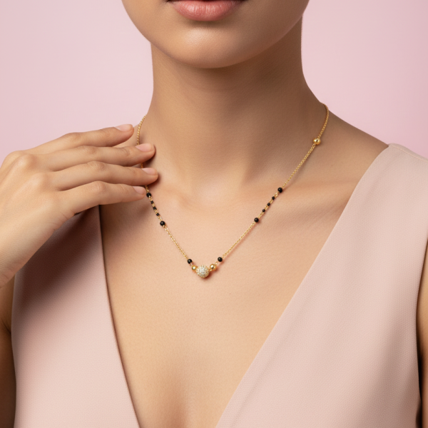 Elegant Black Bead Mangalsutra with Designer Gold Pendant